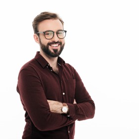 Portrait of a smiling young man in eyewear